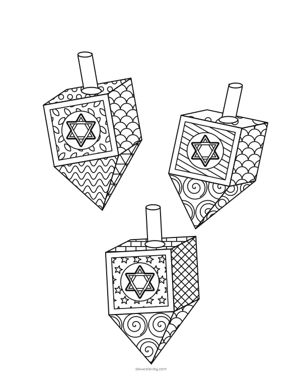 Three dreidels at different angles with patterned faces and star medallions