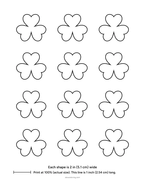 Twelve small shamrock outlines 2 inches wide