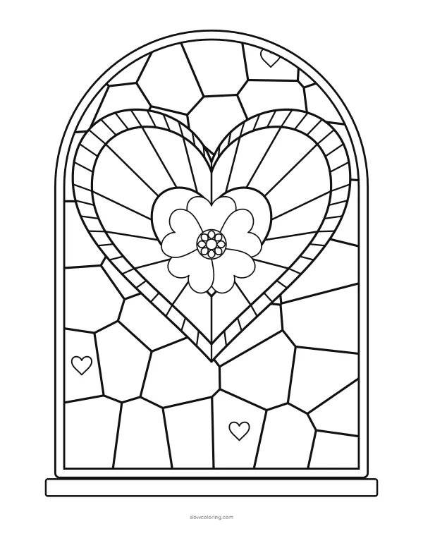 Arched stained glass window with a large heart of radial panes, a heart flower and small hearts in the glass